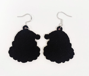 Close-up of 925 silver hooks on black flocked Santa Claus silhouette earrings for Christmas