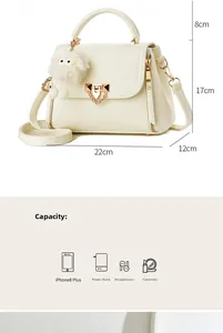 White faux leather crossbody bag capacity guide showing space for cosmetics and phone