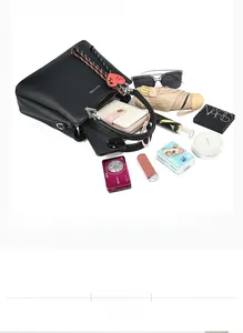 Top view of large black leather tote bag interior showing spacious capacity for daily items