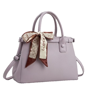 Elegant lilac pebbled leather handbag with decorative scarf and detachable strap