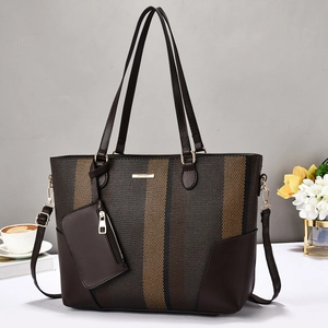 Contrast color tote bag in brown litchi grain faux leather and striped woven fabric