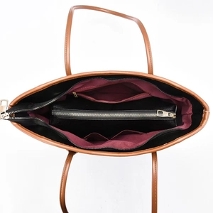 Top view showing the spacious interior of the vintage tote bag with dual-color lining