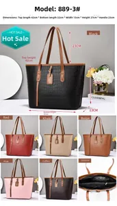 Detailed interior view of tote bag showing zippered pockets and internal compartments