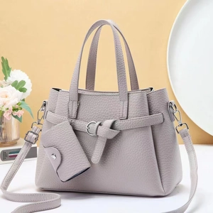 Lavender grey leather tote bag with top handle, crossbody strap and mini pouch