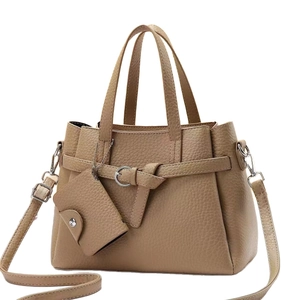 Minimalist khaki leather tote bag with silver ring belt and matching coin purse