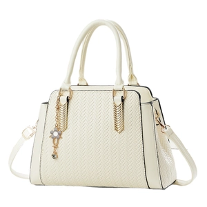 Cream white striped tote bag with woven V-pattern and elegant gold hardware details