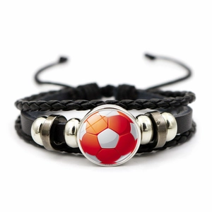 Detail of multi-layer woven leather soccer bracelet with glass cabochon soccer ball charm