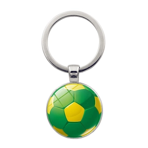 Macro shot of 3D football pattern metal keychain with high-transparency glass dome cover