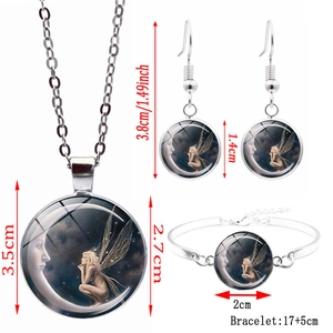 Silver-toned angel and moon jewelry set including necklace, bracelet and earrings