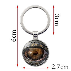 Detailed size view of silver dragon eye glass keychain with 6cm length and 3cm ring diameter