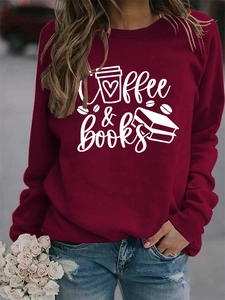 Détail du sweat-shirt bordeaux Coffee & Books avec imprimé graphique et texte blanc épuré