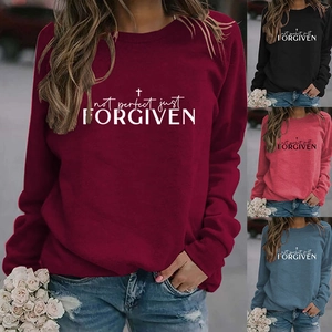 Detail view of cotton blend sweatshirts with religious cross print in multiple colors