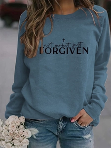 Detail of Not Perfect Just Forgiven printed crewneck sweatshirt with cross symbol