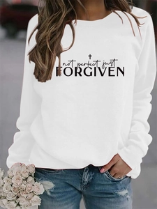 Detail of Not Perfect Just Forgiven print on white long sleeve crewneck sweatshirt