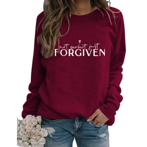Detail of burgundy long sleeve sweatshirt with Not Perfect Just Forgiven graphic print