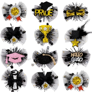 Set of 12 graduation hair clips with glitter ribbons, feathers and star sequins on mesh