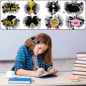 Detail view of 8-piece graduation hair clips with glitter caps and pride medals