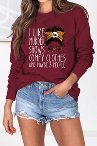 Detail of burgundy sweatshirt with I LIKE MURDER SHOWS print and graphic design