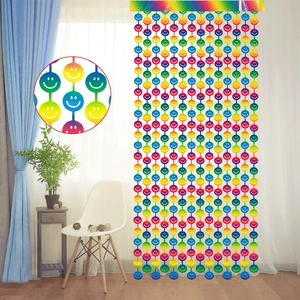 Detailed close-up of rainbow gradient beaded curtain featuring classic smiley face design