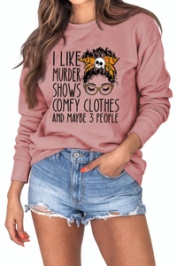 Detail of dusty rose crewneck sweatshirt with humorous illustration and bold typography