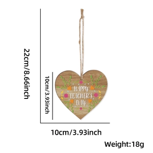 Macro view of heart-shaped wooden teacher gift showing dimensions 10cm by 22cm total length