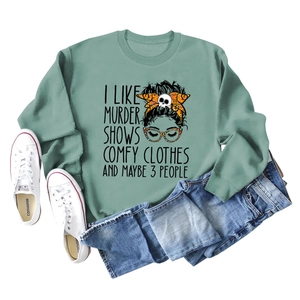 Sage green crewneck sweatshirt with 'I Like Murder Shows' graphic and jeans outfit