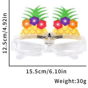 Detail view of glowing pineapple party glasses with tropical flower decor and dimensions