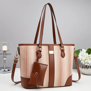 Bolso tote de lona con rayas rosas, detalles de cuero y correa de hombro