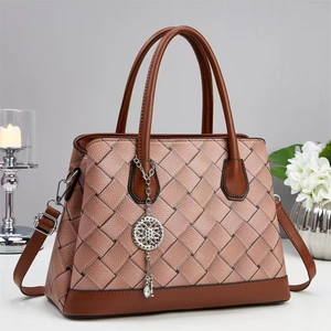 Contrast color woven texture handbag in pink and brown with elegant metallic charm