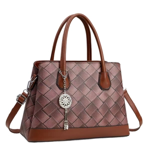 Classic brown woven leather handbag with metallic finish and adjustable shoulder strap