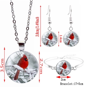 Cardinal bird jewelry set with necklace earrings and bracelet in winter snow scene