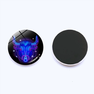 Detailed front and back view of a 25mm Taurus constellation magnetic glass fridge magnet