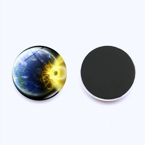 Detailed view of cosmic Earth glass fridge magnet with magnetic backing on white background