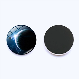 Detailed view showing front galaxy glass dome and black magnetic back of the fridge magnet