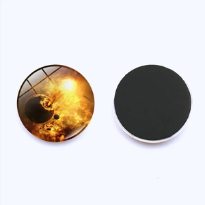 Front and back view of a galaxy glass fridge magnet with magnetic backing