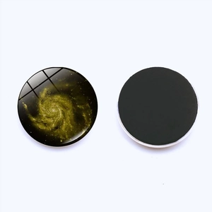 Detailed view showing the glass surface and magnetic backing of the nebula fridge magnet
