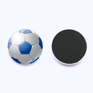 Detail view showing blue soccer pattern glass front and magnetic back of the 30mm fridge magnet