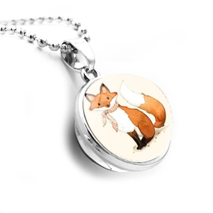 Detail of fox illustration pendant necklace with double-sided glass ball and bead chain