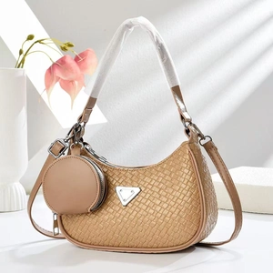 Beige embossed croissant shoulder bag with mini coin purse and metal triangle logo
