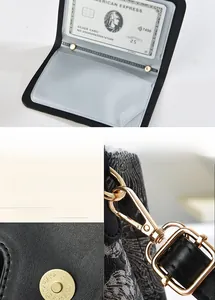 Détail du porte-cartes en cuir noir avec mousqueton doré et fermeture magnétique