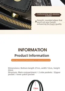 Détails de l'intérieur du grand sac cabas noir gaufré avec compartiments et dorures