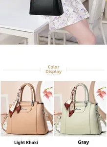 Detailed view of leather tote bags with silk scarves in black, light khaki and grey colors