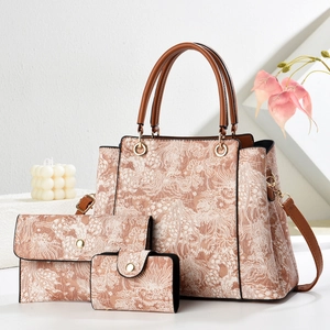 Set de trois sacs cabas à motifs floraux avec anses en cuir brun et pochettes