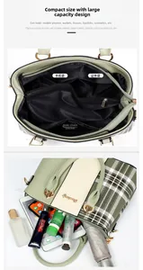 Detailed view of dark green plaid handbag interior structure and large capacity pockets