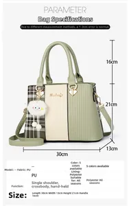 Detailed dimensions of green embossed tote bag with measurements and plush ball charm