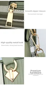 Detailed macro view of smooth gold zippers and premium hardware on a green striped bag