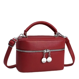Red pebbled leather small crossbody bag with silver hardware and top handle for women