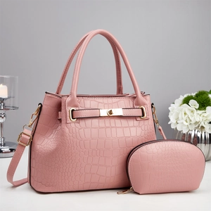 Pink crocodile pattern shoulder bag and matching purse set with gold hardware details