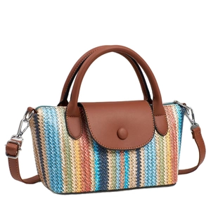 Colorful striped woven shoulder bag with brown leather flap and adjustable strap