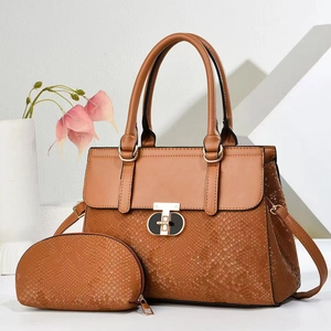 Brown faux snakeskin tote bag set with golden hardware and matching pouch for women